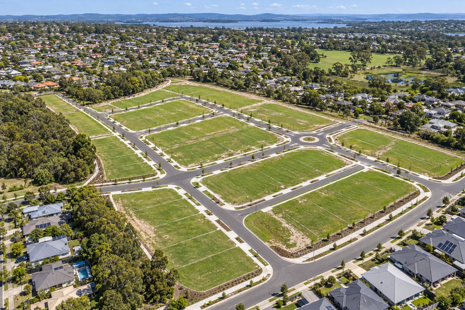 Aerial view of a residential land subdivision and surrounding neighbourhood